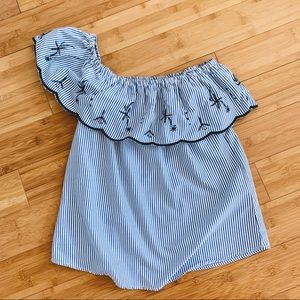 Off shoulder striped blouse with matching earrings